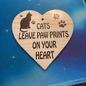 Heart-Shaped Cat Sign with Black Print